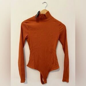 Woman’s NWT Lulu’s Burnt Orange Bodysuit